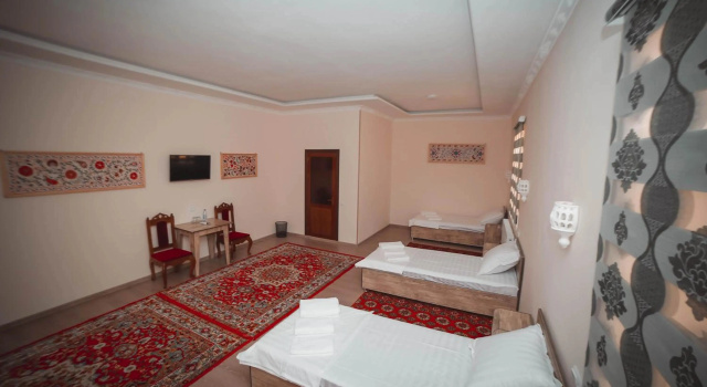 Oqilanur Guest House, Reservar Casa de hóspedes Hotéis em Khorezm region com estacionamento, Estacionamento