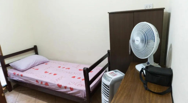 Кровать в общем номере Casa & Hospedagem Carol