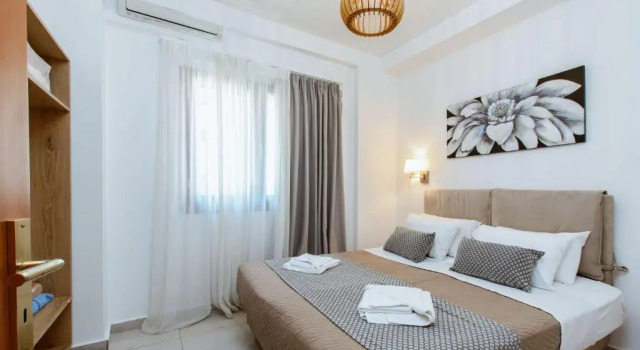 Семейный номер Standard с частичным видом на море Deluxe Suites