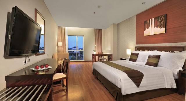 Номер Deluxe Aston Tanjung City Hotel