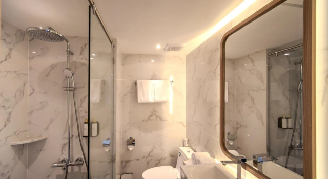 Люкс Cozy Stay Studio Room at Altuz Seturan Yogyakarta Apartment By Travelio