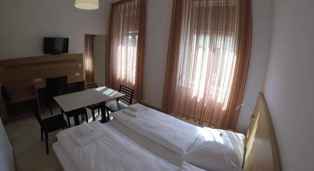 Standard quadruple chambre Hotel Aton