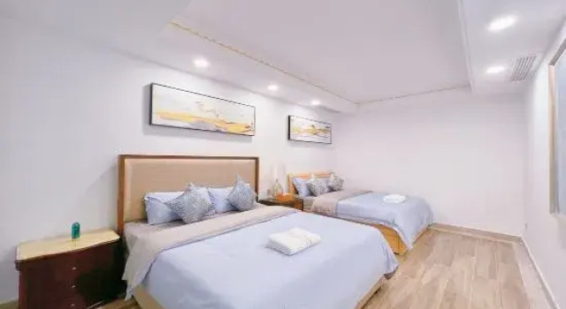 Кровать в общем номере с 6 комнатами Huizhou Nankunshan Chuyi Designer Parent-child Theme Pool Hot Spring Villa