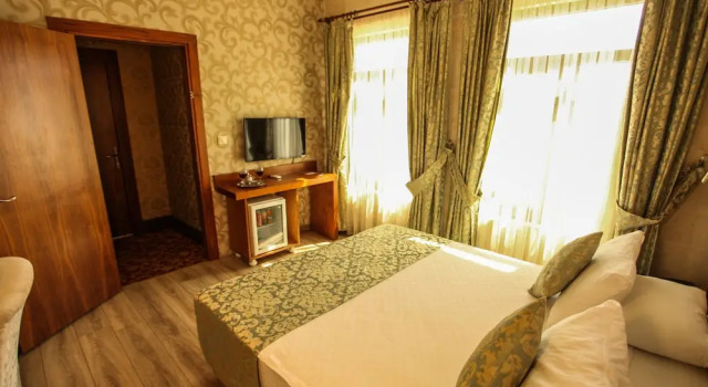 Номер Deluxe Tuğhan Hotel