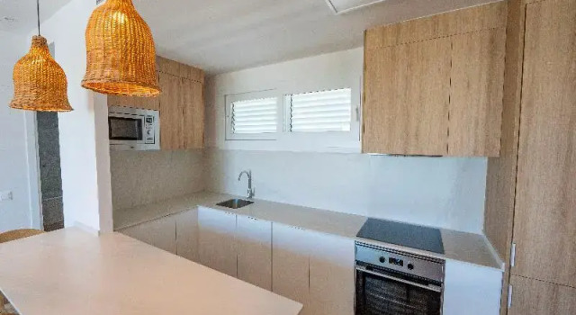 Кровать в общем номере Punta Candor Suites