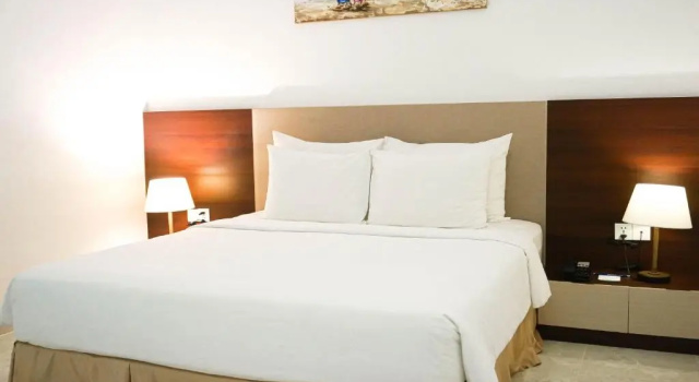 Номер Standard с 2 комнатами с балконом и с видом на сад CostaBella Resort Nha Trang