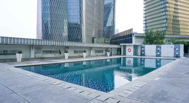 2BR Cozy at Empyreal Epicentrum Apartment By Travelio