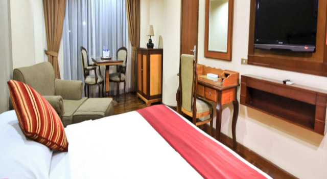 Номер Deluxe Grand Menteng Hotel