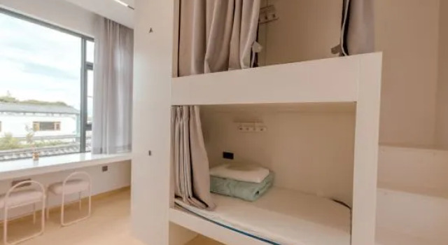 Кровать в общем номере (женский номер) Chaoge Youth Hostel (Dali Ancient Town South Gate)