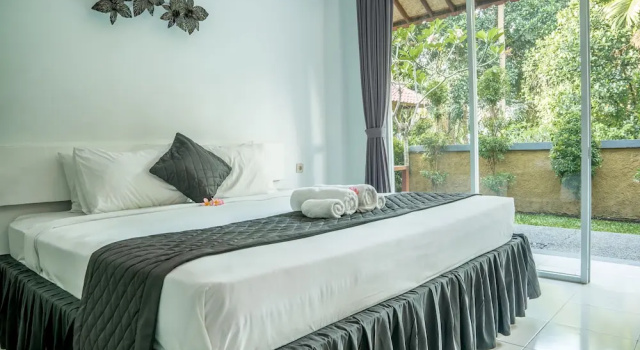 Двухместный номер Deluxe с 3 комнатами с балконом и с видом на сад Puri Suksma Ubud