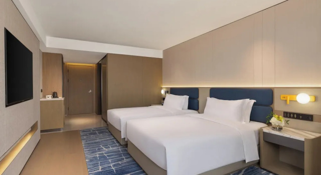 Четырёхместный номер Premium voco Suzhou Guanqian Street by IHG