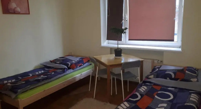 Кровать в общем номере Macedonia Home