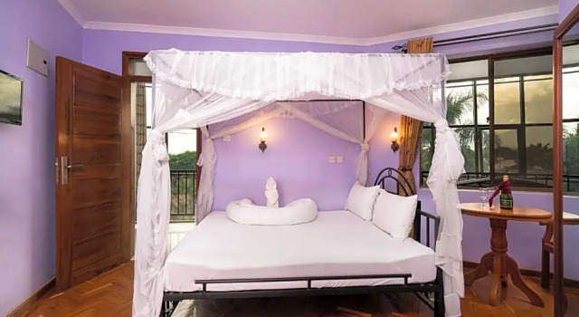 Номер Deluxe Mrimba Palm Hotel