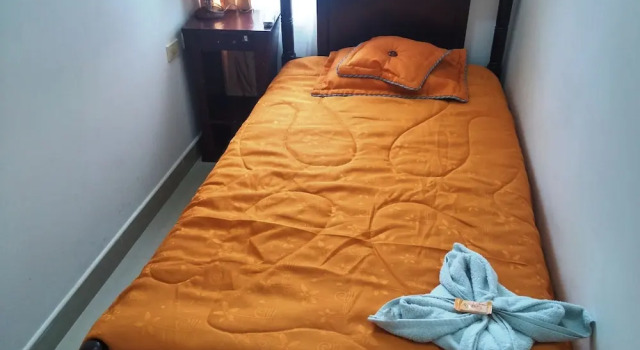 Кровать в общем номере Hotel Andino Real