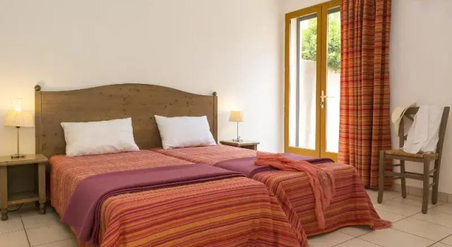 Кровать в общем номере Odalys Residence Les Hameaux de Capra Scorsa