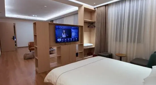 Люкс Deluxe Magnotel Hotel (Mengzi Yinhe Road)
