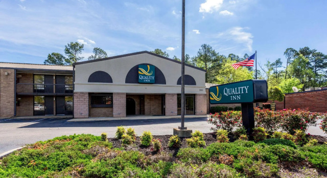 Кровать в общем номере Quality Inn Tupelo Central