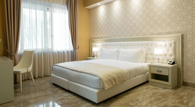 Четырёхместный номер Standard с видом на сад Aurum Suites