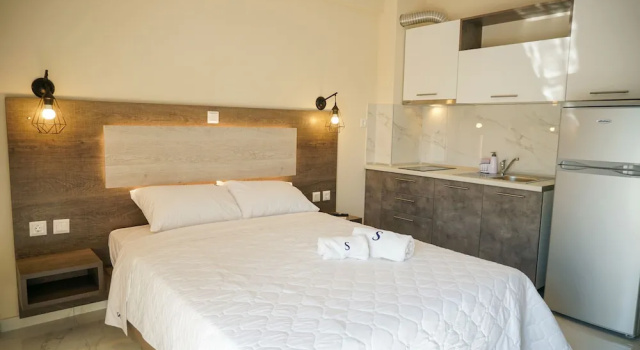 Апартаменты Sinodinos Deluxe Apartments
