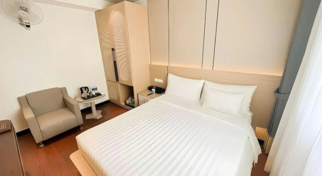 Номер Deluxe A25 Premium Hotel - 277 Lê Thánh Tôn