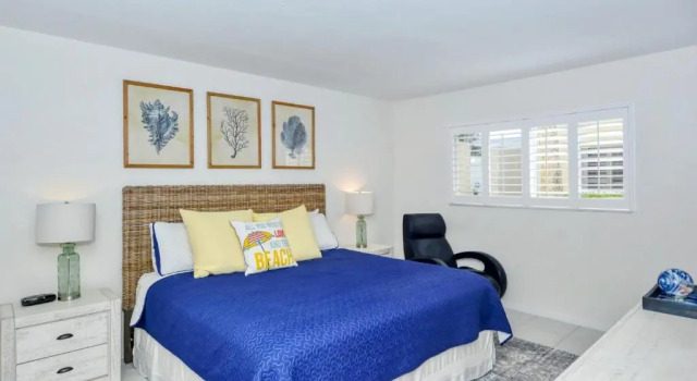 LaPlaya 101A Step out to the beach from your screened lanai Light and bright end unit
