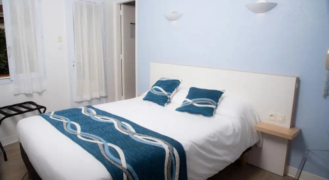 Четырёхместный номер Standard с 2 комнатами с балконом Hotel Les Dunes