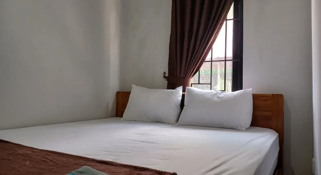 SPOT ON 92475 Rc Homestay Syariah, Boek Hotel Tamansari Indonesië