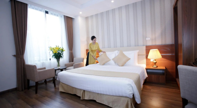 Кровать в общем номере Hanoi Pomihoa Hotel