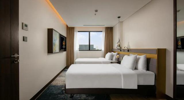 Люкс с 2 комнатами Mövenpick Living West Hanoi