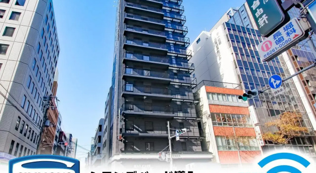 Кровать в общем номере HOTEL LiVEMAX Shinsaibashi East