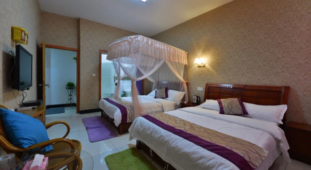 Wuzhen Pomegrante Garden Hotel, Rezerwuj Hotel Wuzhen Jiaxing