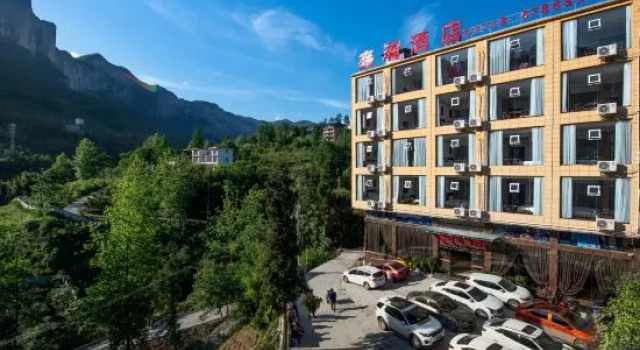 Xinhan Hotel, Забронировать Отель Энши Хубэй