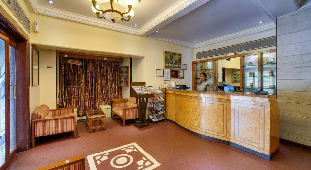 Кровать в общем номере Ramee Guestline Hotel Khar