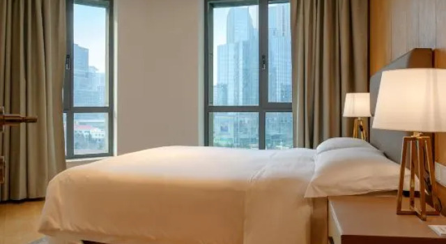 Семейный люкс Executive с 2 комнатами с видом на город Haiyi International Apartment