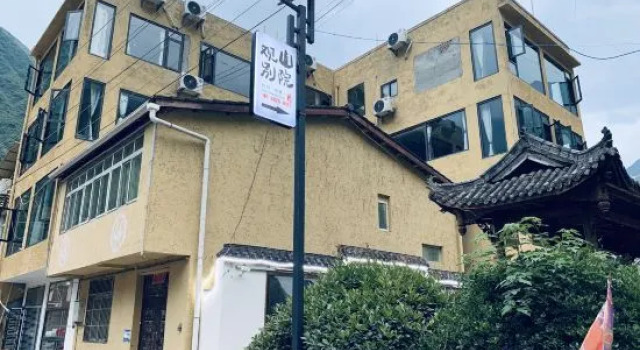 Wenchuan Guanshan Courtyard, Book Hotel Hoteller i Fengyi med parkering, Parkering