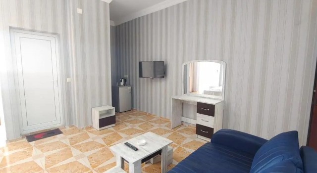Четырёхместный номер Comfort с балконом и с красивым видом из окна Hotel kvariati Nugo