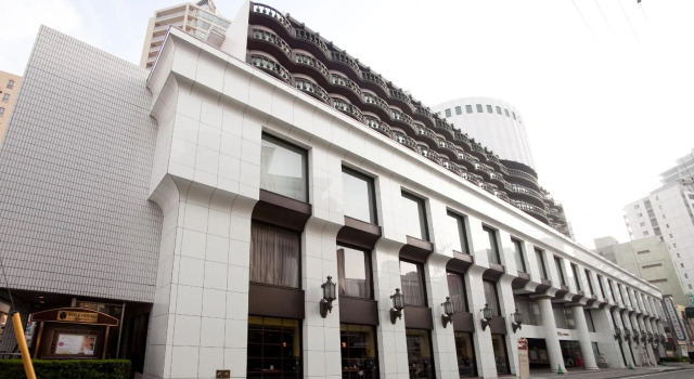 Кровать в общем номере Rose Hotel Yokohama, The Distinctive Collection By WORLDHOTELS