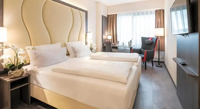 Четырёхместный номер Deluxe PLAZA INN Mannheim