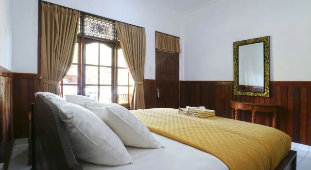 Номер Deluxe Puri Nusa Beach Hotel