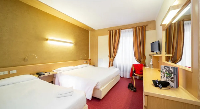 Трёхместный номер Classic Hotel Monzoni - San Pellegrino