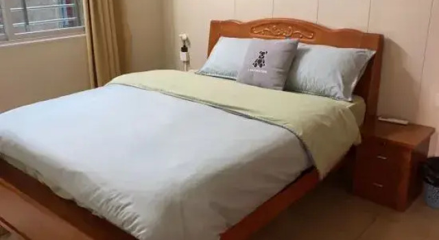 Кровать в общем номере Bayi Homestay (Quanzhou West Street Kaiyuan Temple)