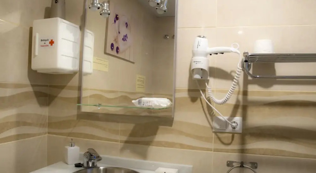 Кровать в общем номере Sunnyliving
