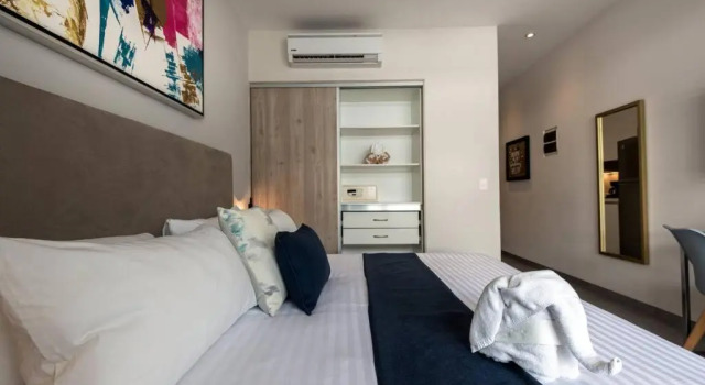 G312N Paty Luxury Resident, walking to the beach & 5thAv, Забронировать Апартаменты/квартира Отели Плая-дель-Кармен с парковкой, рядом с Пляжный клуб Mamitas, Парковка