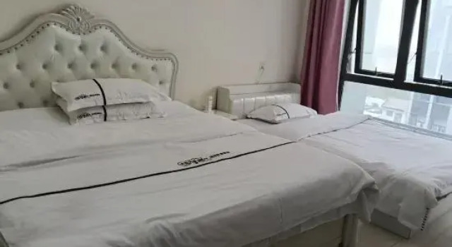 Кровать в общем номере Shanghai Fuxiangju Homestay (Fengxian Baolong Plaza)
