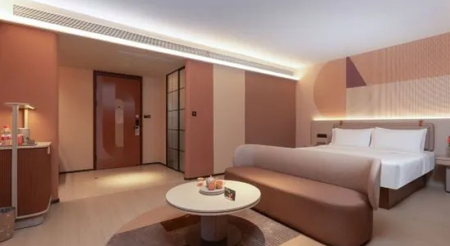 Кровать в общем номере Orange Hotel (Xuzhou Yunlong Lake Sanpeng Square Branch)