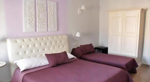 Четырёхместный номер Standard с балконом Simonettas Rooms