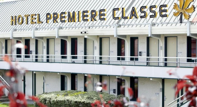 Кровать в общем номере Premiere Classe Gueret