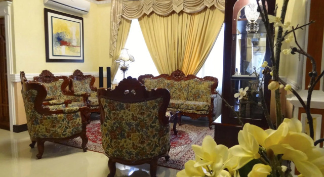The Executive Villa Inn & Suites