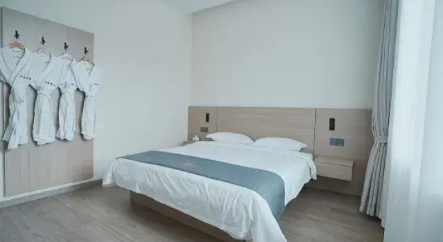 Люкс с 2 комнатами Dali Yixinyuan Hot Spring Homestay (Xiashankou Branch)