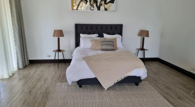 Beautiful 3 bedroom home in a gated complex with private garden and pool